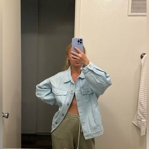 Fashion nova new still in package light blue oversized jeans jacket. Size M.